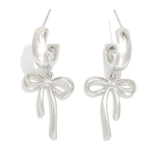 Metal Tone Hoop Earrings Featuring Bow Dangle Detail Silver