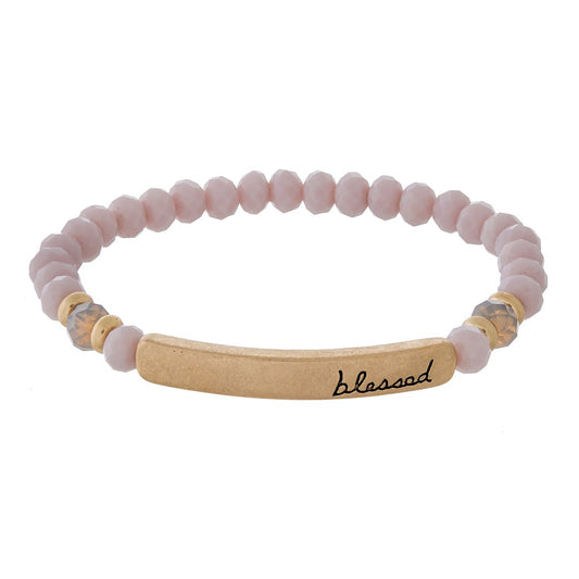 Beaded stretch bracelet with a bar focal, stamped with "blessed" Lavender
