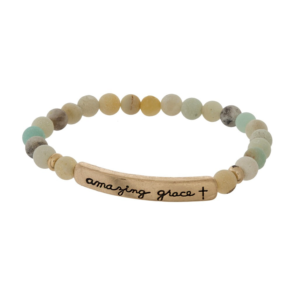 Beaded stretch bracelet with a bar focal, stamped with "amazing grace." Amazonite
