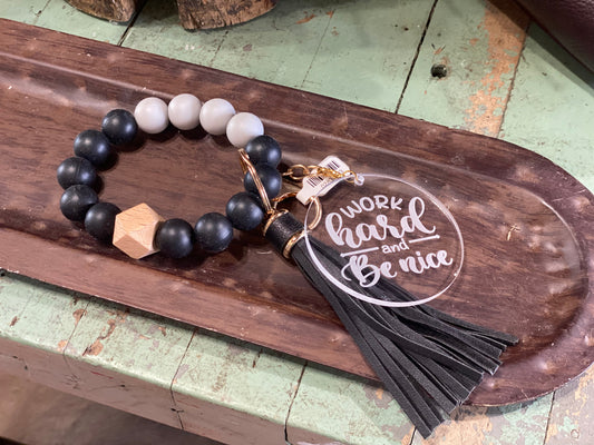 Work Hard and Be Nice SVF Black and White Grey Marble Silicone Wristlet Beaded Key Chain Bracelet with Tassel and Motivational Engraved Acrylic Charm of choice!