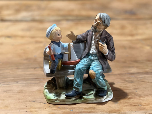 Norleans Japan Man on Bench with Boy Figure - The Mustard Seed Collection, The Seed
