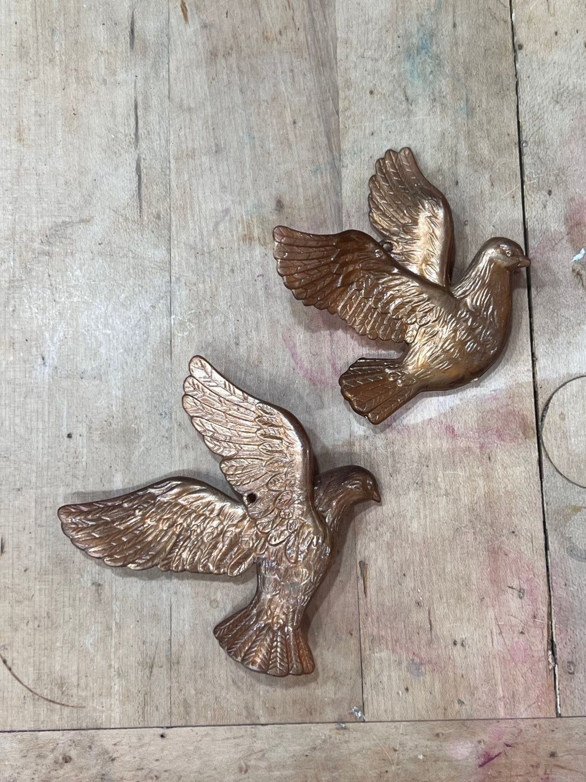 Pair of Bronze-Colored Soaring Doves
