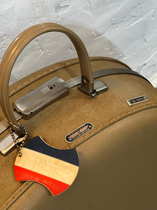 Round American Tourister Vintage Suitcase