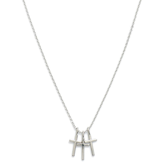 Metal Tone Necklace Featuring Cross Pendants Silver