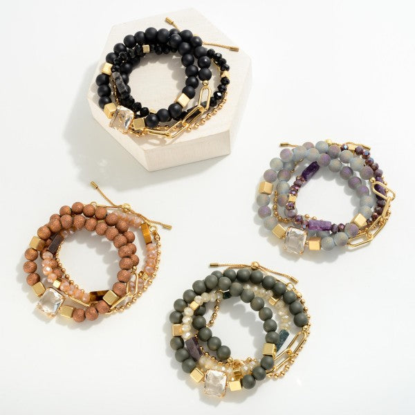 Set of Four Bracelets Featuring Chain Link, Bead and Rhinestone Details
