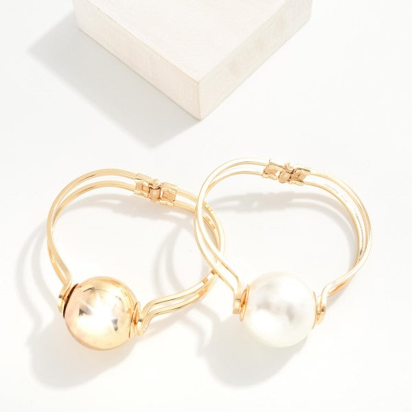 Hallow Metal Tone Bangle Bracelet With Metal Tone Ball Detail