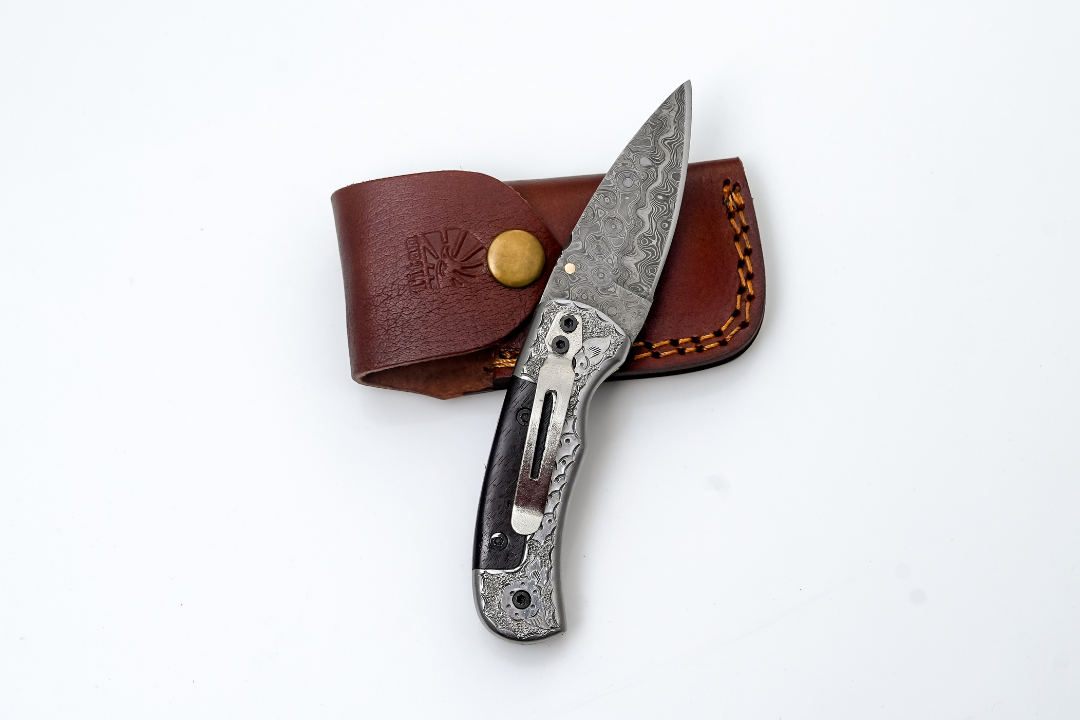 Hand-Forged Damascus Folding Knife | Engraved Bolster, Dark Wood Handle & Intricate Spine File Work