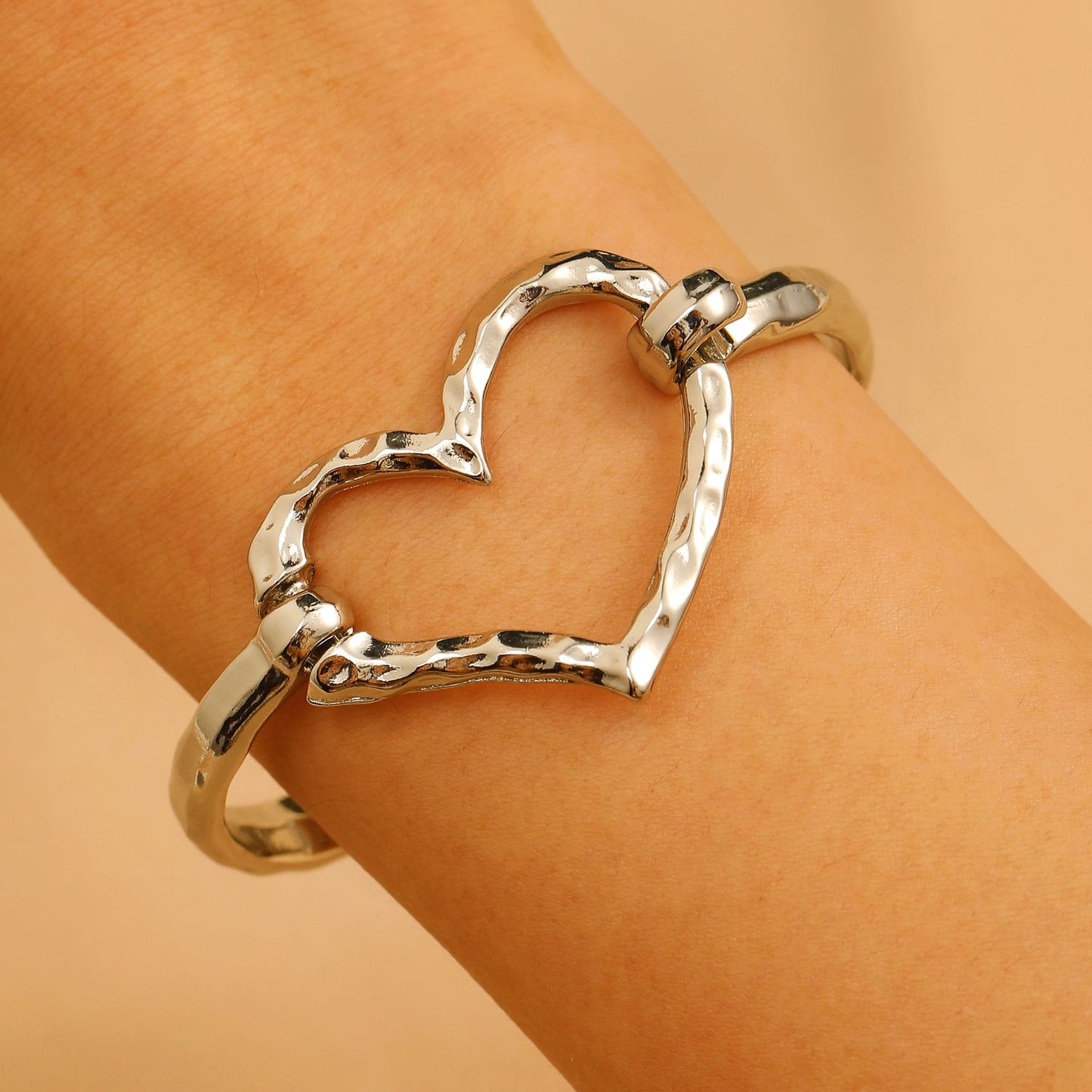 Metal Tone Structured Heart Bracelet Silver