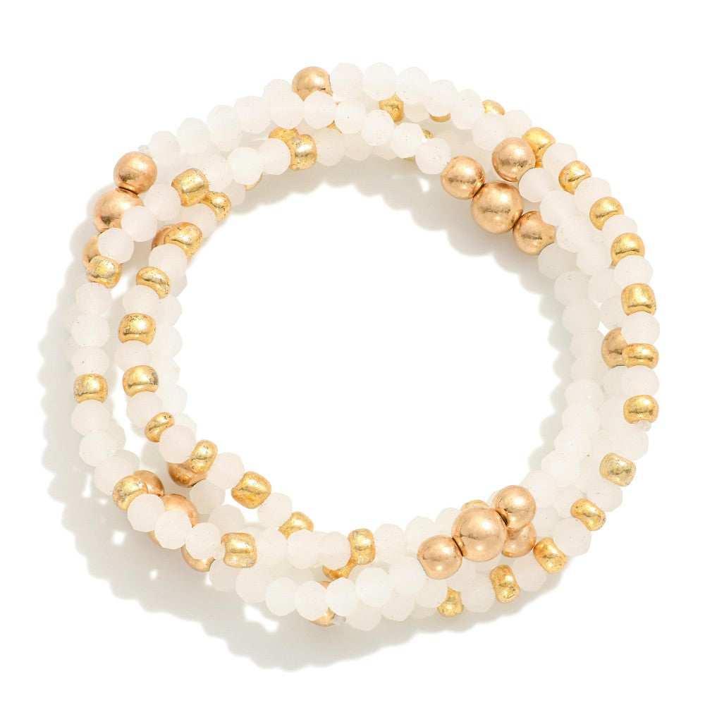 Set of Four Faceted Bead Stretch Bracelets Featuring Gold Tone Accents