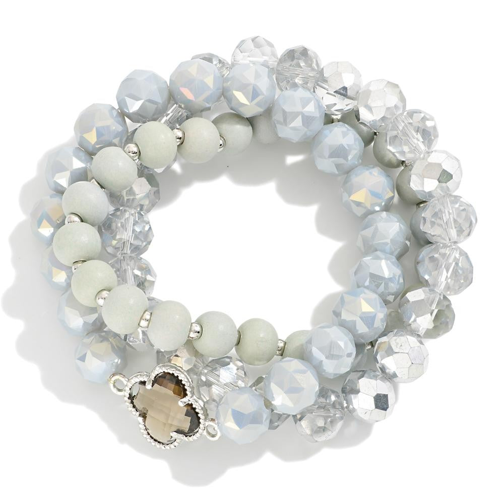 Set of Three Beaded Stretch Bracelets Featuring Clover Station