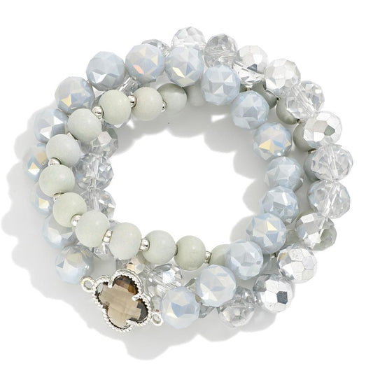 Set of Three Beaded Stretch Bracelets Featuring Clover Station