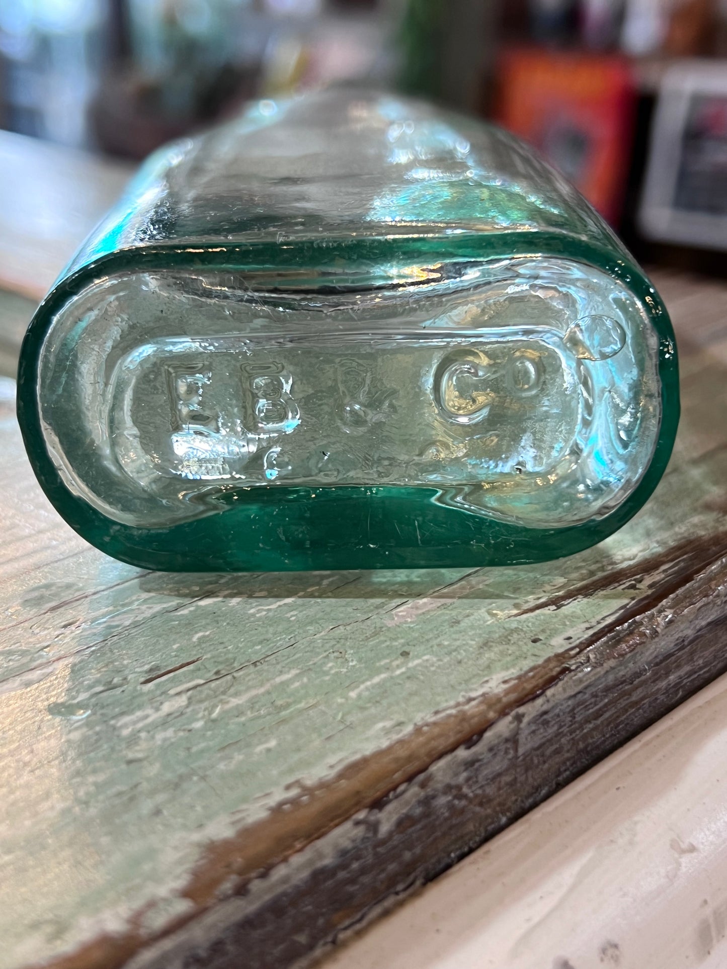 E B & Co Green Glass Apothecary Bottle Flat Bellied