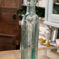 Antique Clear Green Glass Flask Bottle Warranted