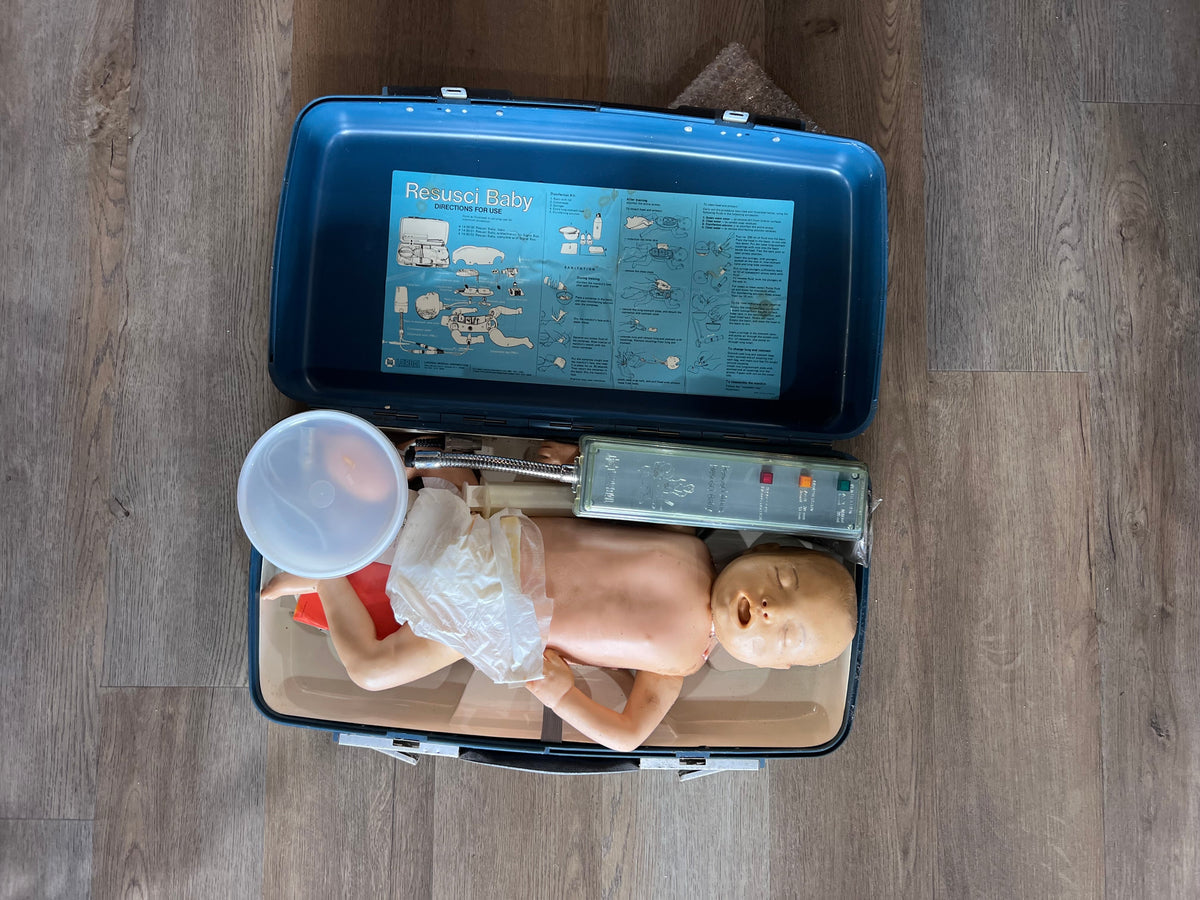 Vintage Laerdal Resusci Baby CPR Training Manikin with Electronic Signal Box