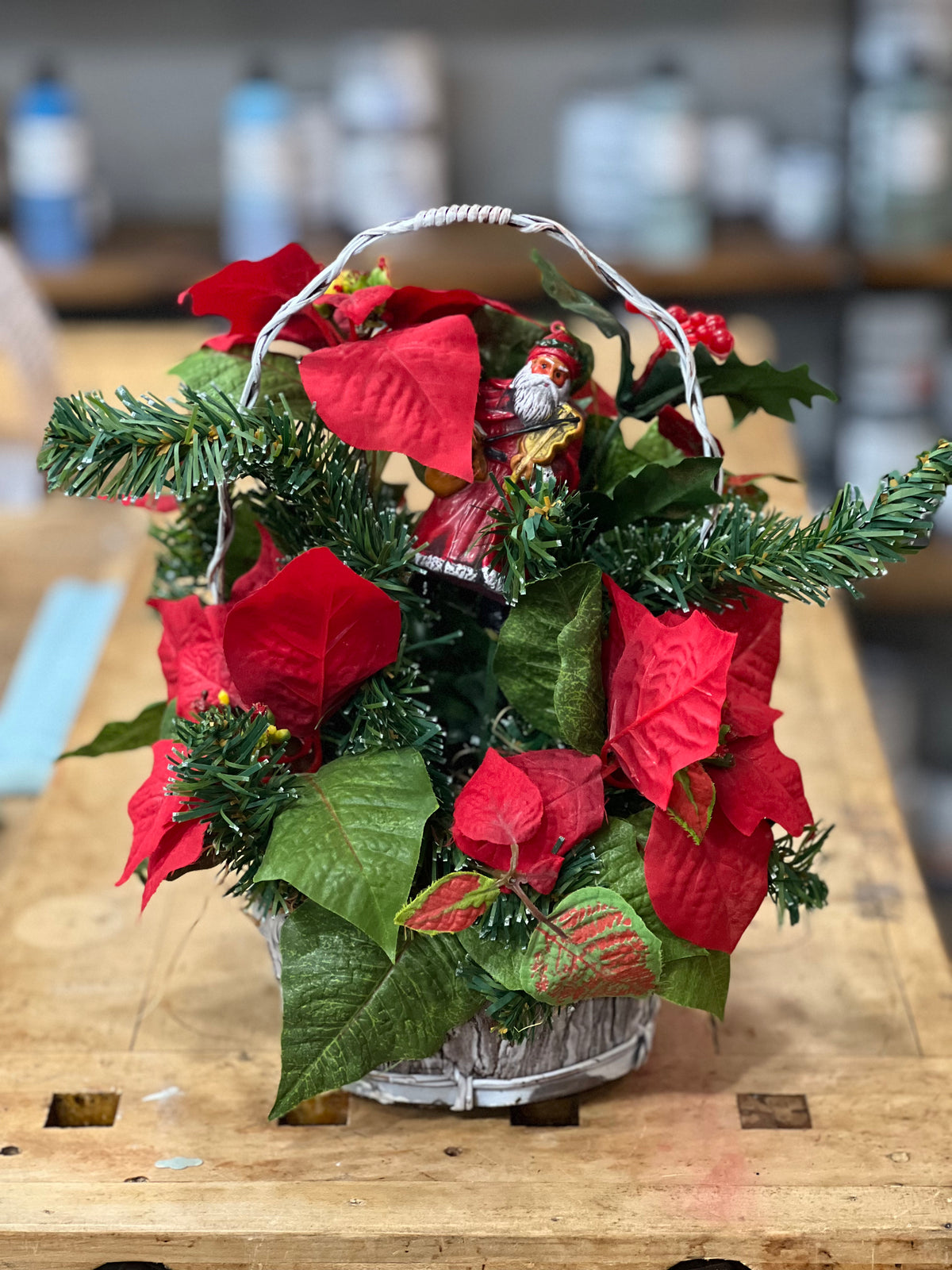 Artificial Christmas Poinsettia and Santa Basket Arrangement
