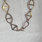 Mid-Century Modernist Openwork Geometric Jewelry Set: 28" Necklace & 2" Dangle Earrings