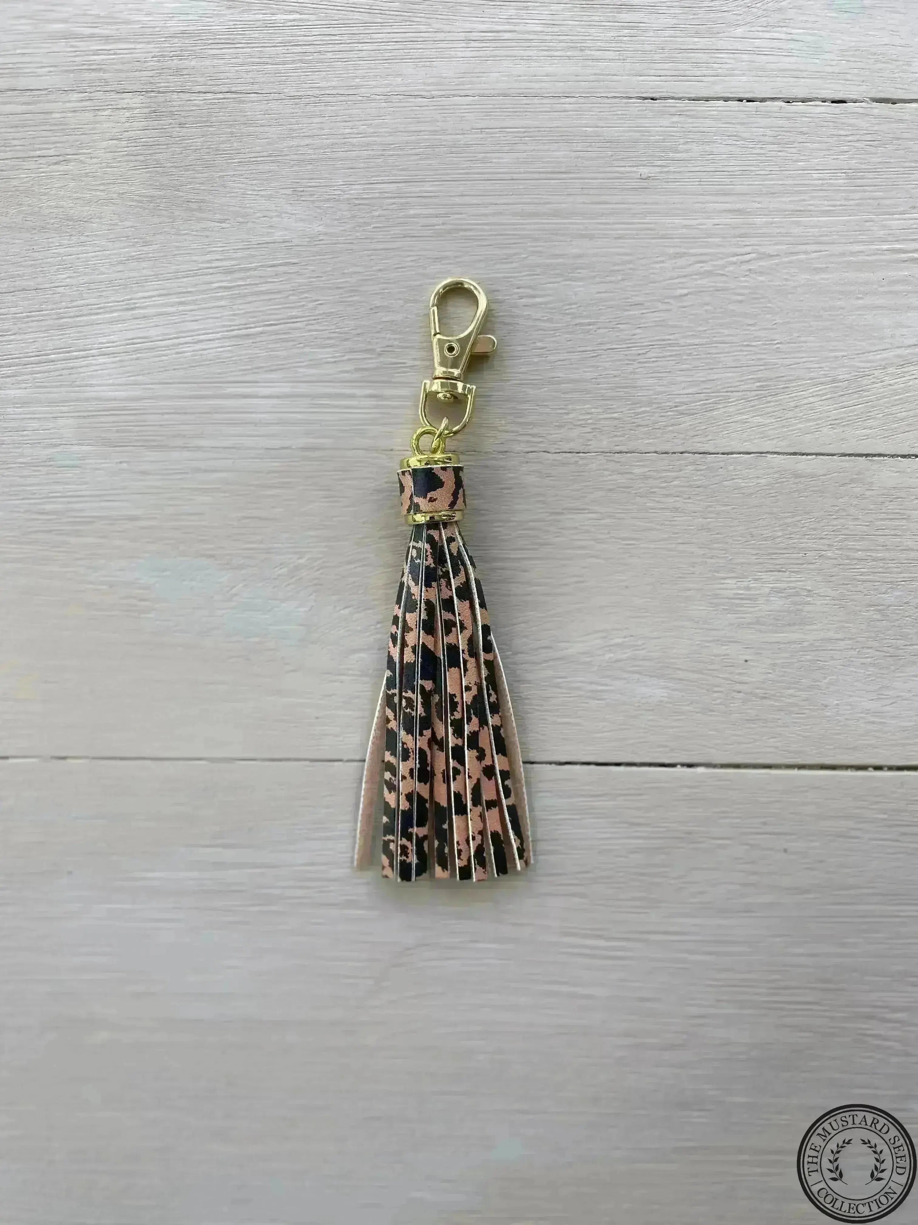 SVF Animal Print Faux Leather Tassel and Motivational Engraved Acrylic Charm of choice! The Mustard Seed Collection, The Seed