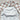 The Grayson Long Sleeve Bib - Construction: Powder Blue Calla & Friends