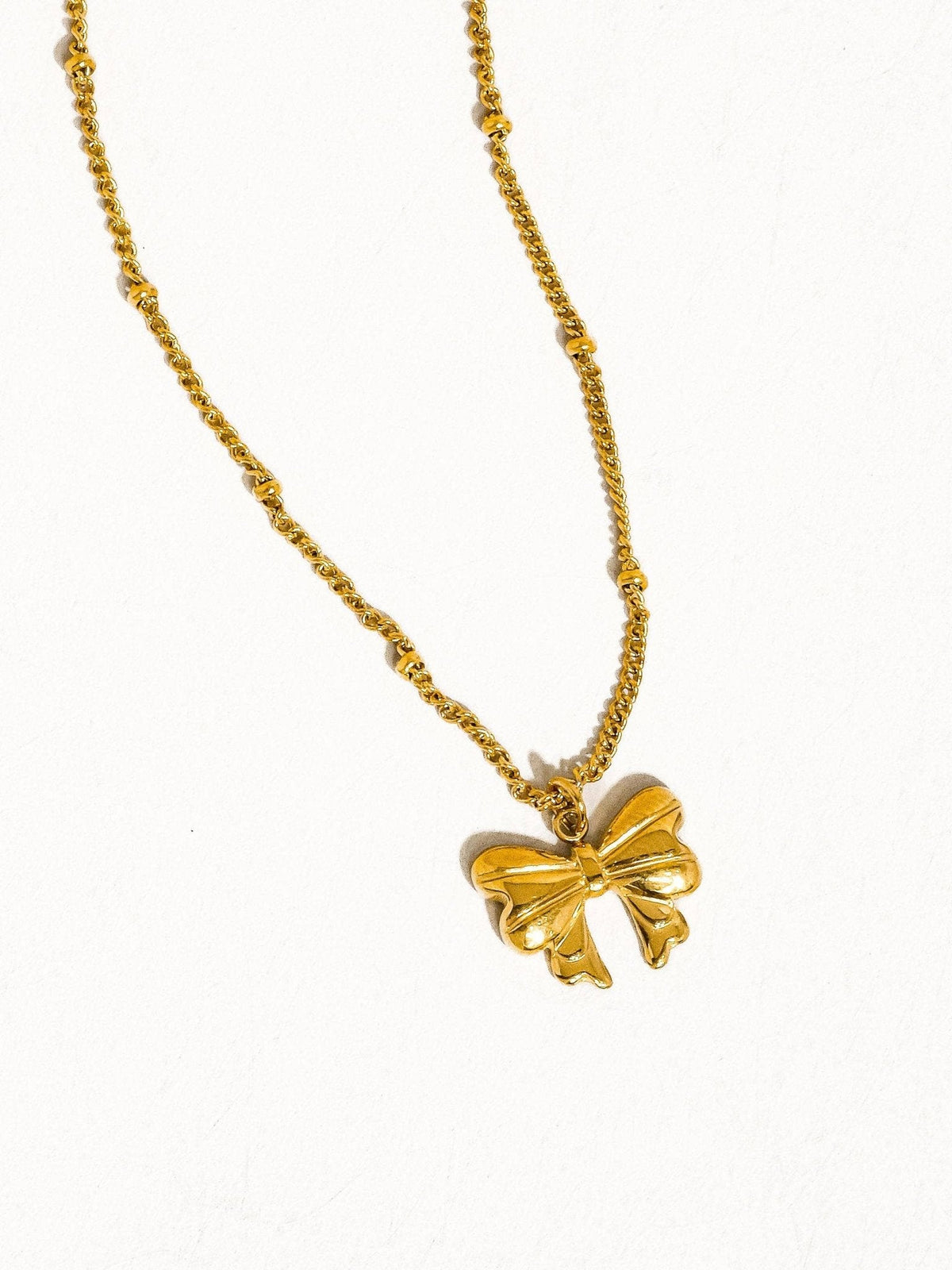 Alannah 18K Gold Non-Tarnish Bow Necklace: Yellow Gold - The Mustard Seed Collection, The Seed