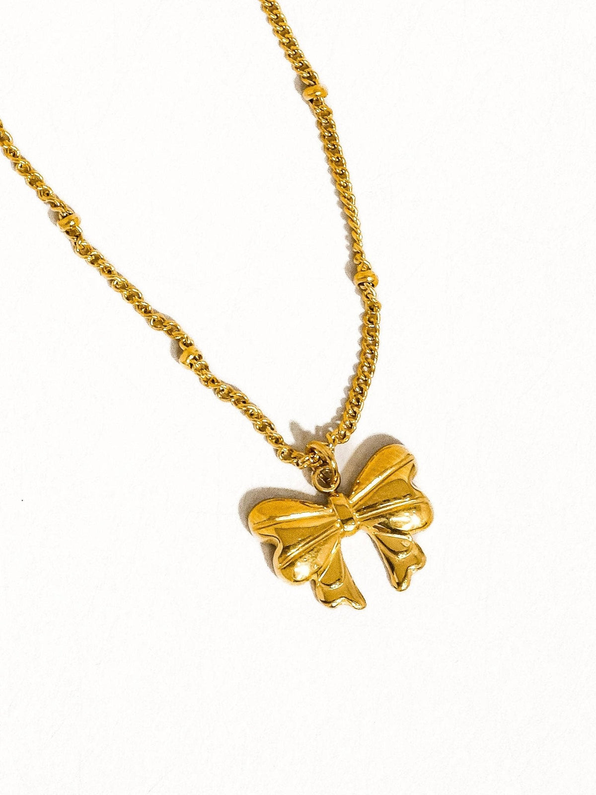 Alannah 18K Gold Non-Tarnish Bow Necklace: Yellow Gold - The Mustard Seed Collection, The Seed