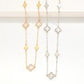 Chain Link Necklace Featuring Pearlescent Clover Stations With Cubic Zirconia Borders 