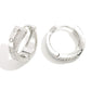 Do Everything In Love Overlapping Metal Huggie Hoop Earrings Featuring Cubic Zirconia Details Silver