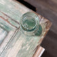 E B & Co Green Glass Apothecary Bottle Flat Bellied