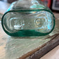 E B & Co Green Glass Apothecary Bottle Flat Bellied