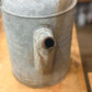 Galvanized Watering Can with dent 