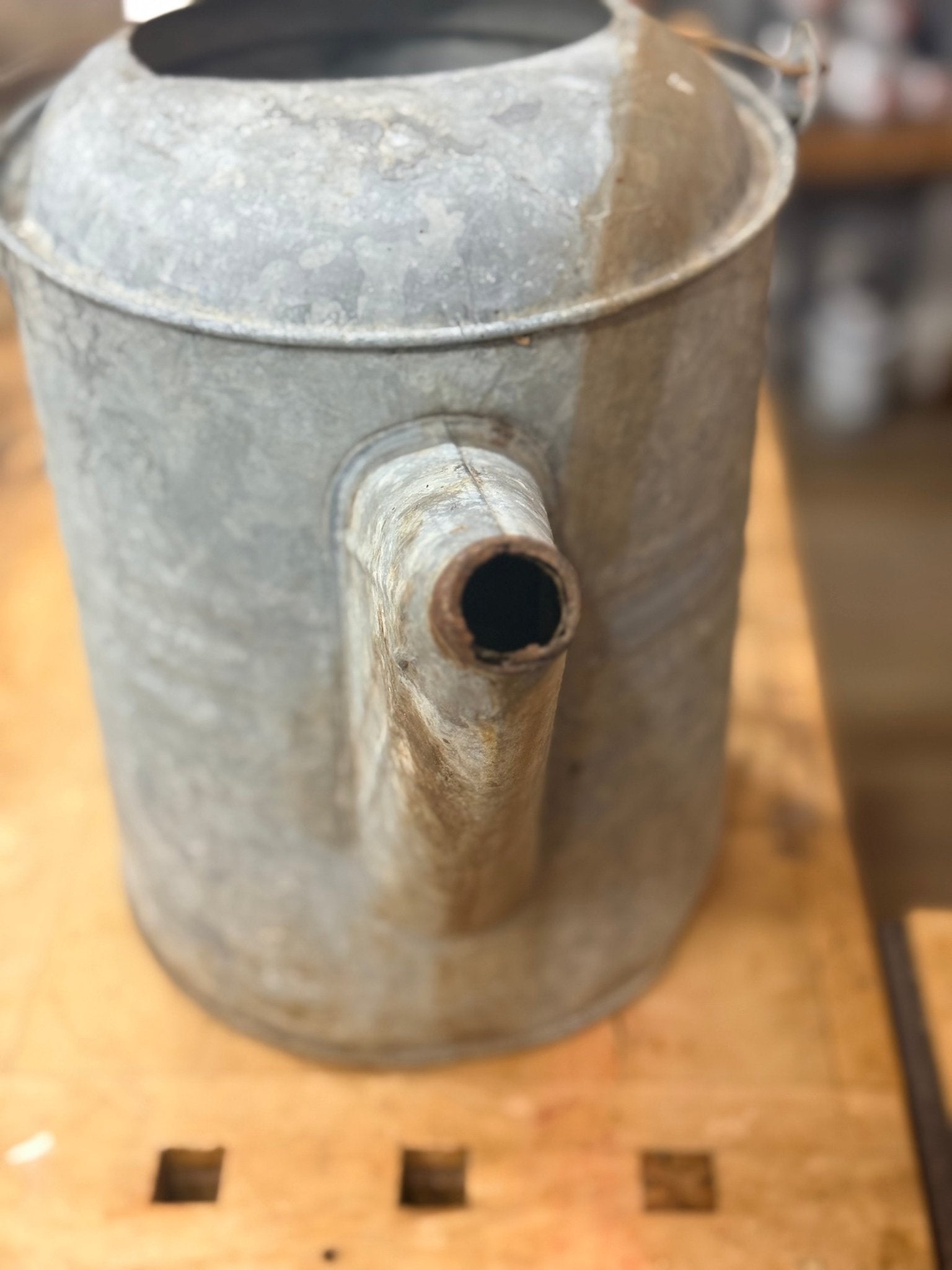 Galvanized Watering Can with dent 
