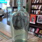 Green Glass Apothecary Bottle Flat Bellied High Crowned
