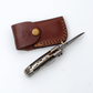 Hand-Forged Damascus Folding Knife | Engraved Bolster, Dark Wood Handle & Intricate Spine File Work - The Mustard Seed Collection, The Seed