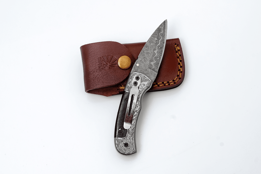 Hand-Forged Damascus Folding Knife | Engraved Bolster, Dark Wood Handle & Intricate Spine File Work - The Mustard Seed Collection, The Seed