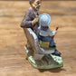 Norleans Japan Man on Bench with Boy Figure - The Mustard Seed Collection, The Seed