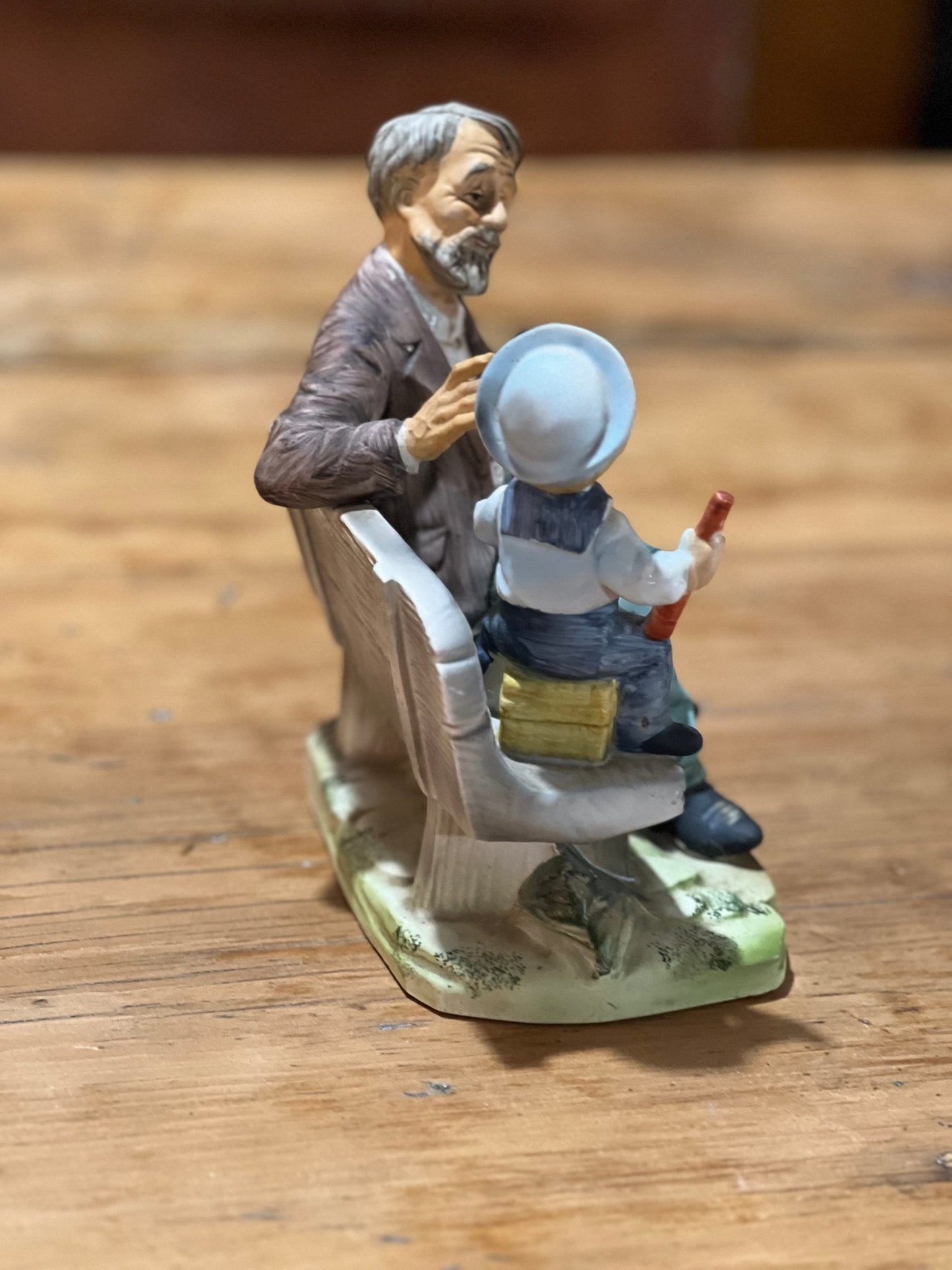 Norleans Japan Man on Bench with Boy Figure - The Mustard Seed Collection, The Seed