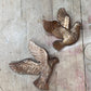 Pair of Bronze-Colored Soaring Doves 