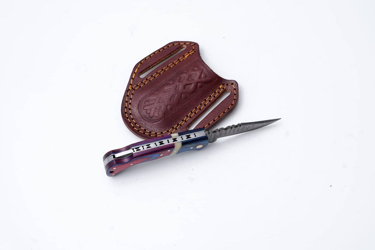 Patriot Series Damascus Folding Knife – Red & Blue Handle with Leather Sheath - The Mustard Seed Collection, The Seed