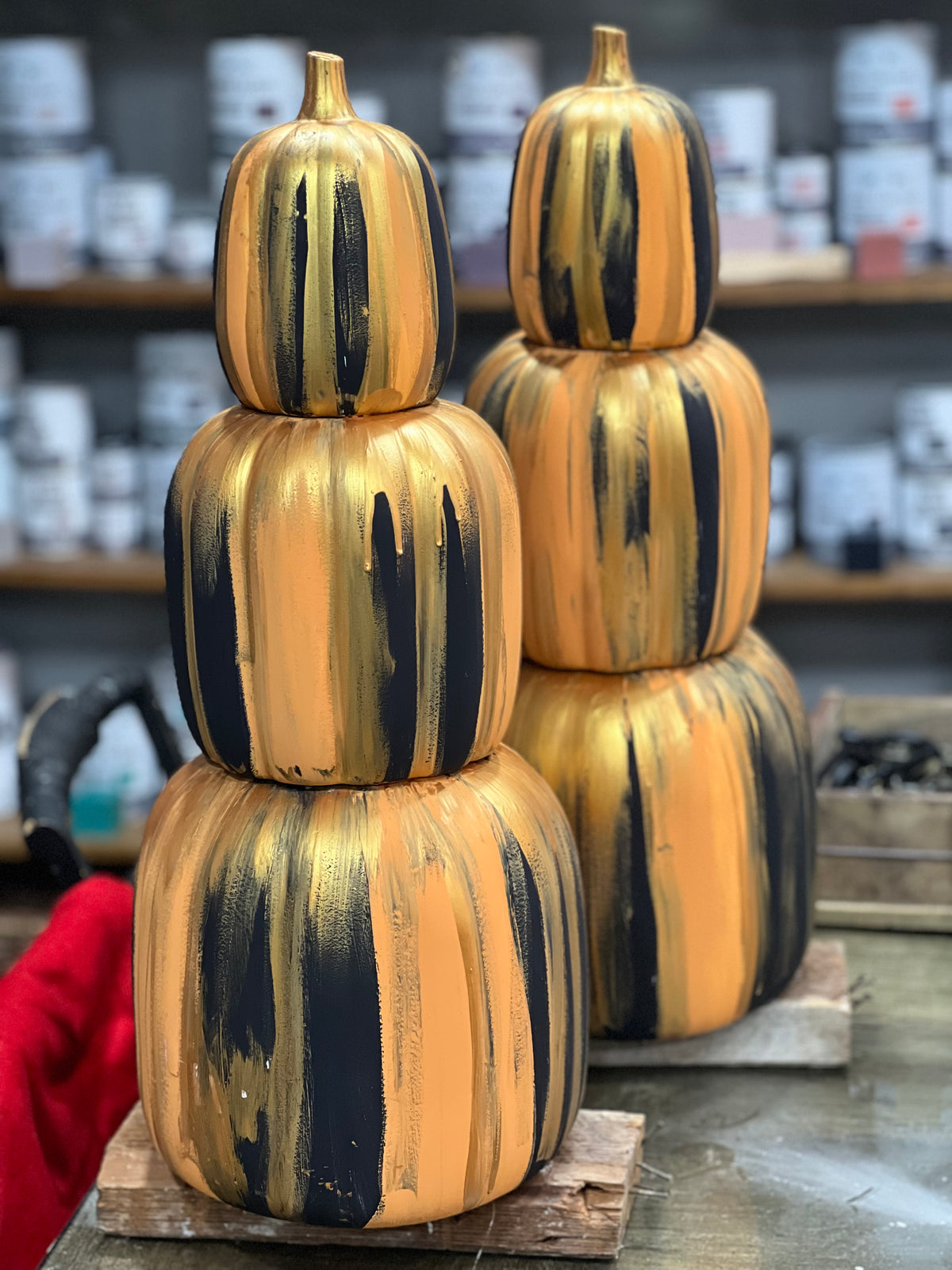 Stackable pumpkins painted orange, black and gold with Annie Sloan Chalk Paint