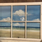 Sybil Nestor Beachscape behind a Vintage Window 