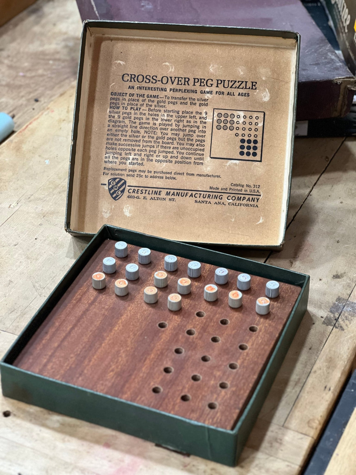 Vintage Cross-Over Peg Puzzle by Crestline Manufacturing Co. – Mid-Century Wooden Brain Teaser 