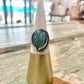 Vintage Navajo Ring with Turquoise, Feather, and Rope Around Edge