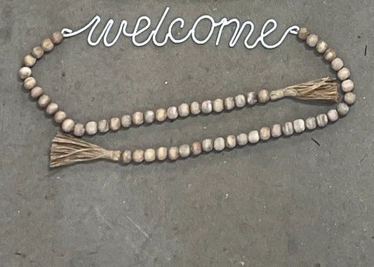 Tassel Tied Garland Welcome Sign