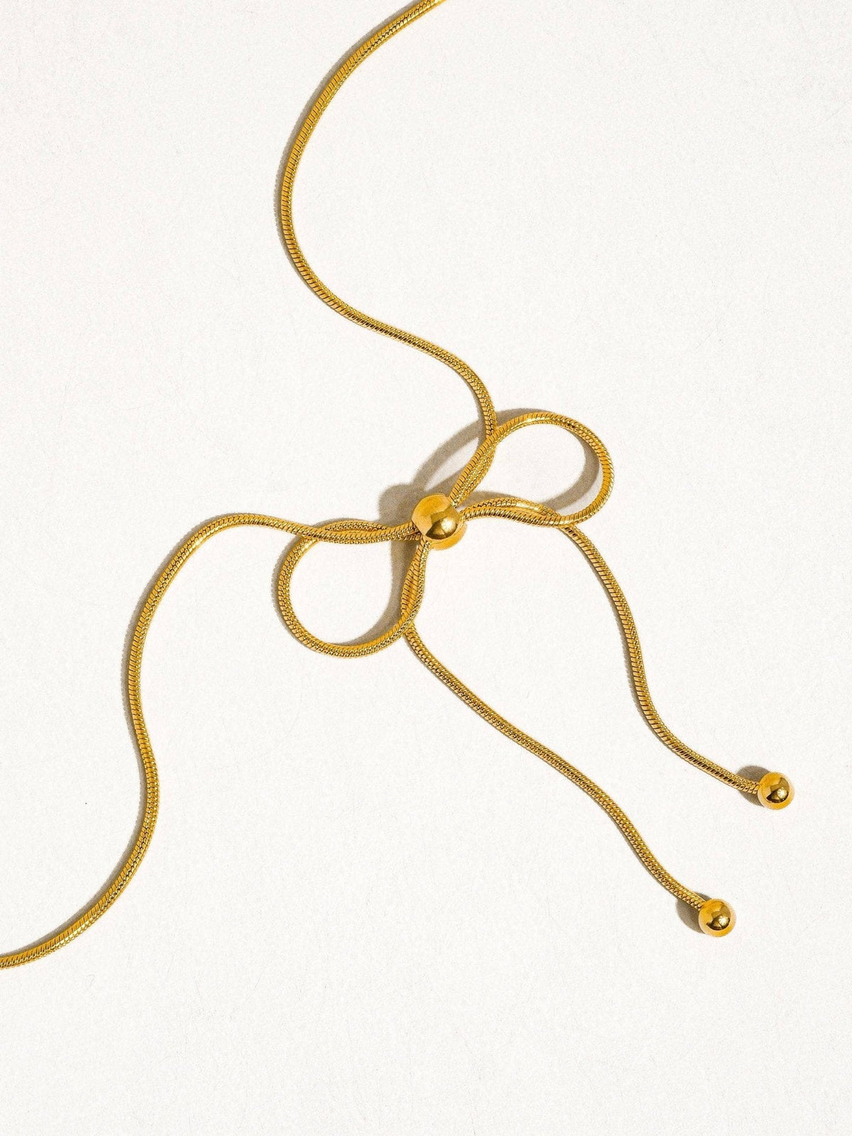Wildrose 18K Non-Tarnish Bow Chain Necklace: Yellow Gold - The Mustard Seed Collection, The Seed