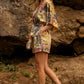 Yellow Satin Patchwork Print Half Sleeve Surplice Romper 